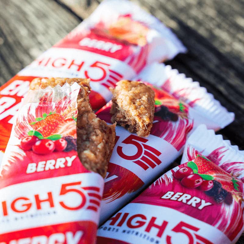 Close-up of a High5 Energy Bar broken open, with more bars in the background